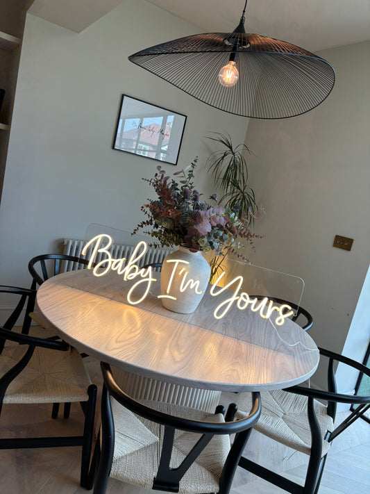 Baby I’m yours neon sign