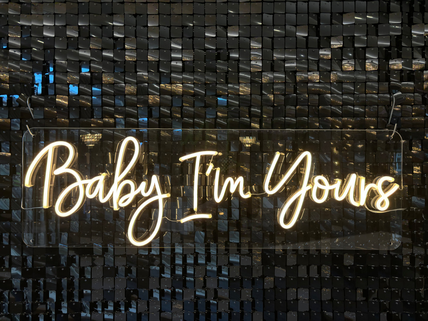 Baby I’m yours neon sign