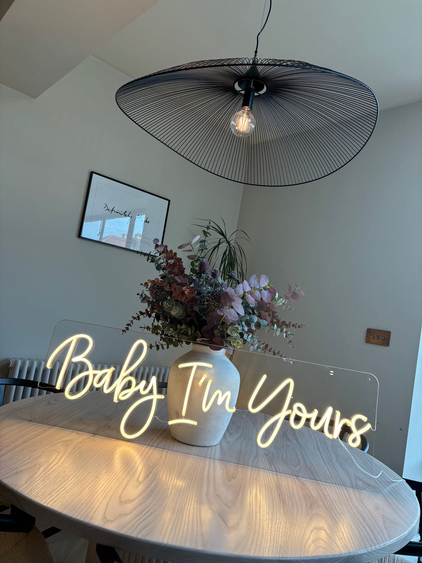Baby I’m yours neon sign