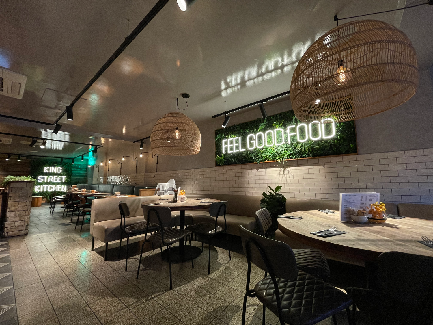 A custom LED Neon Sign in a restaurant that says Feel Good Food in Manchester, UK