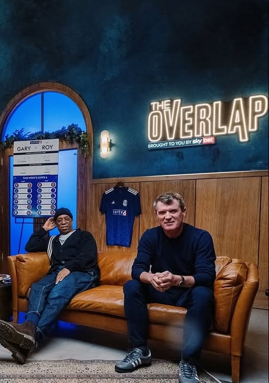 The Overlap LED neon sign reading ‘Brought to You by Sky Bet’ in a podcast studio setup
